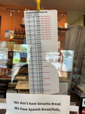 Spanish Rolls pricing. There's a bunch of random signs like the one at the bottom of this.