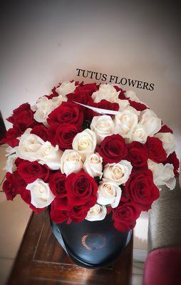 100 Red & white roses. An elegant & beautiful way to show someone how much you love them.