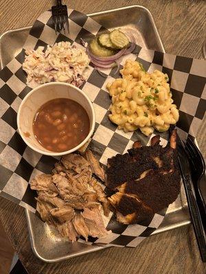 Pulled pork, brisket, baked beans, mac and cheese, cole slaw