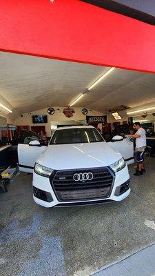 Alejandro doing his quality work on my suv.