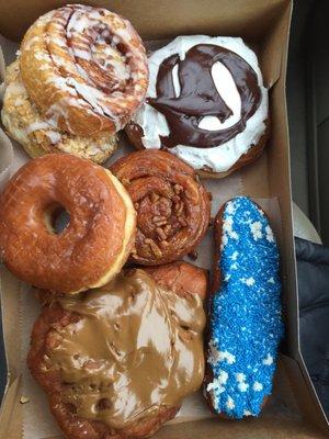 Almond pastry, cinnamon roll, frosted cow, glazed donuts, Carmel pecan roll, Maple apple fritter, frosted and sprinkles long John.