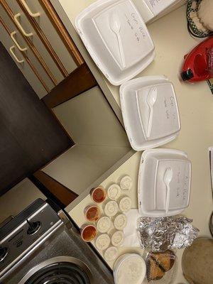 Well done take out, with clear labels, plenty of sauces, pita bread points, and napkims