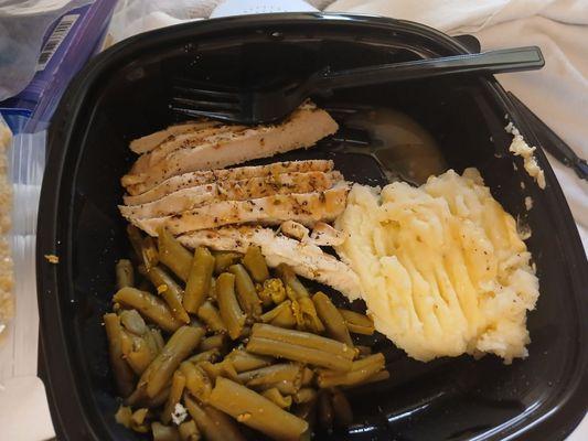 Lunch Sliced chicken breast, green beans, mashed potatoes, with my tiny pkg of Italian dressing for my salad.