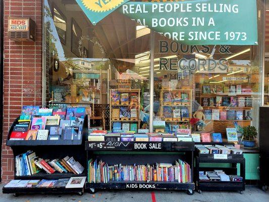 Discounted books in front of store