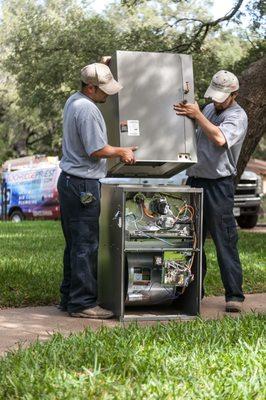 LP Techs preparing to install an HVAC system.