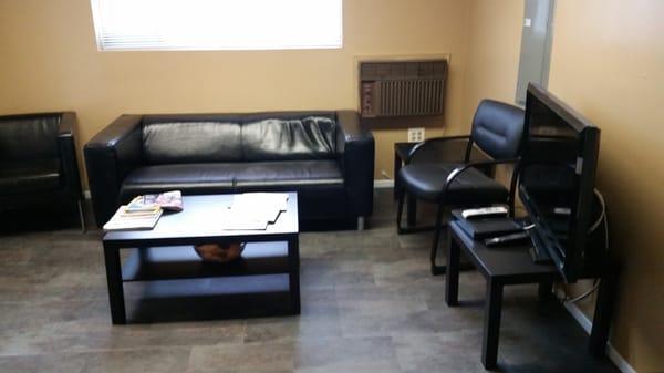 Nice clean comfortable waiting room with wi fi and cable TV