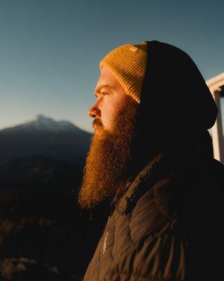 Portrait of Ben looking at the sun rise over Mt. Shasta!