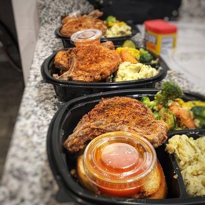 Caribbean style fried pork chops dinner, homemade mash and mixed veggies.