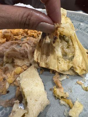 Green tamales with very little filling