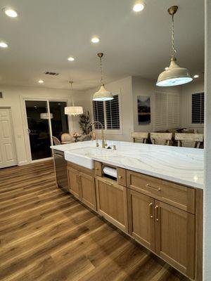 Kitchen island countertop with farmer's sink. Cambria Everleigh Quartz.