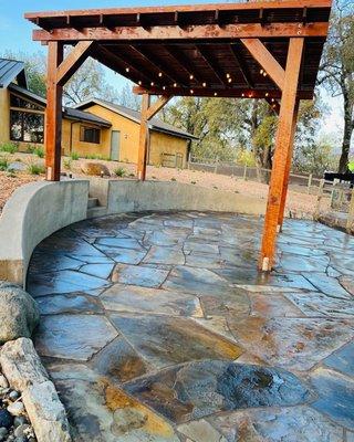 Redwood pergola build with chunky 8x8 posts.