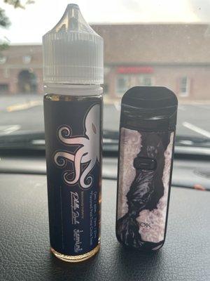 That is my vape that I use in general but the left is the vape juice I bought (it is fantastic, tasted like fruity pebbles/fruit loops)