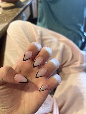 Stiletto black nails