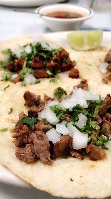 Tacos de Carne Asada, Carnitas, and  Al Pastor.