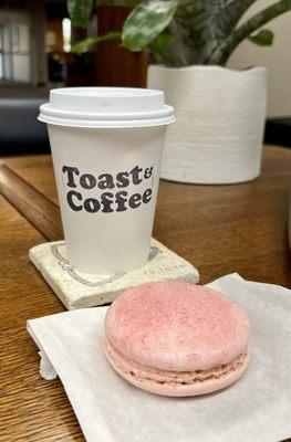 Pour-over coffee and a rosé macron