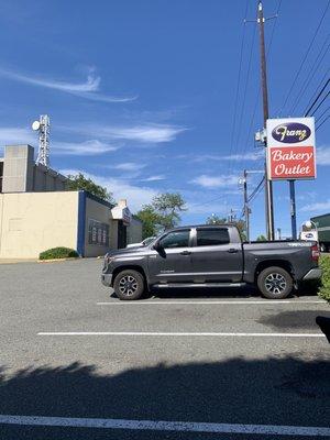 Sign and store front as viewed from the parking lot.