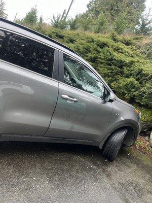 Like brand new.  Kia Sportage door glass install