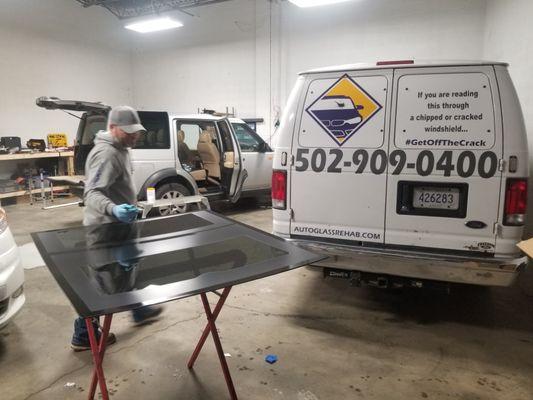 Installing panoramic roof glass in a landrover