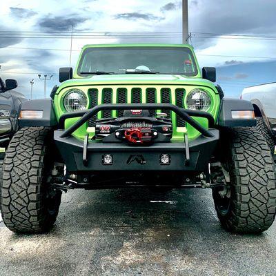 Lift kit, wheels and tires, bumper, winch and more