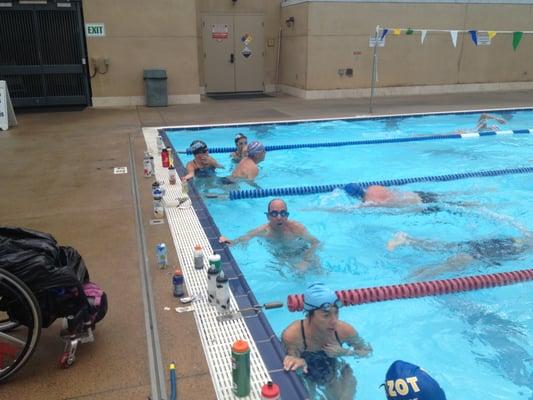 Short breaks between swims during Nova Masters swim practice at Soka University