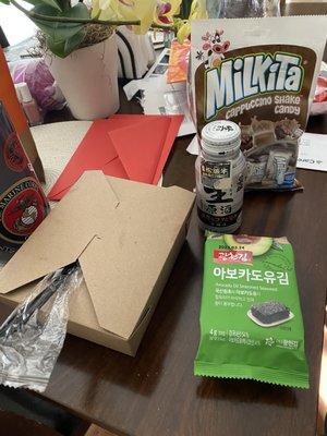 Sake, Mandu dumplings, milkita candies and some seaweed...