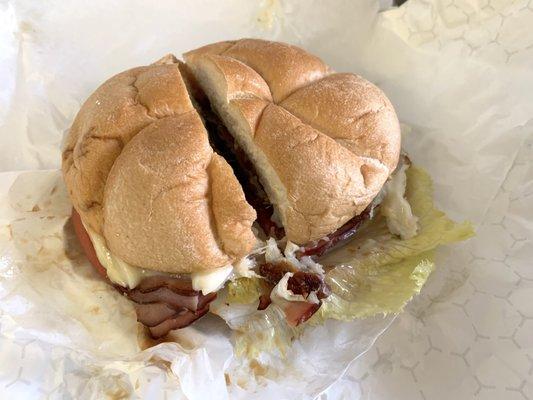 Chicken Cordon Bleu sandwich (chicken, ham, provolone, lettuce, tomato, mayo) on Kaiser roll