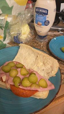 Doing their  job because they forgot to put on 3 things to my sandwich... pickles, extra Mayo, and lettuce. I want a refund...