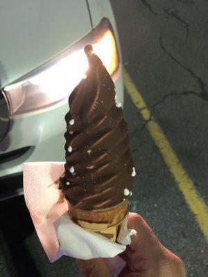 Chocolate dipped small vanilla cone