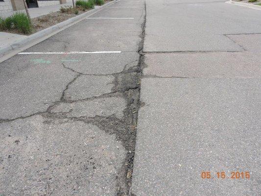 Asphalt deteriorating two years after installation.