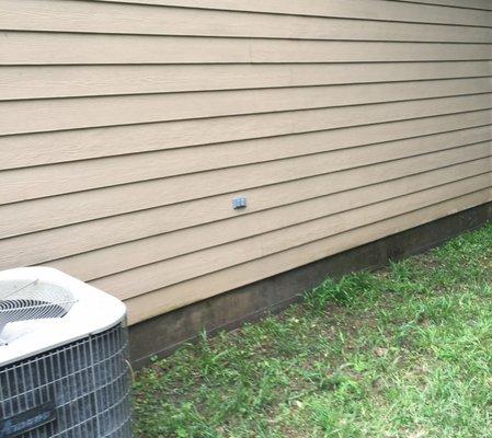 After picture of house siding.