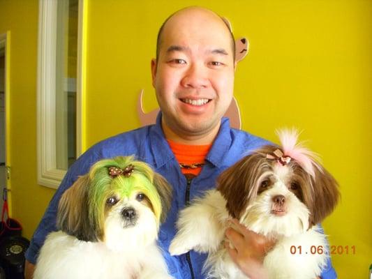 Nelson and his two well-groomed dogs, Pumpkin and Sparkle.