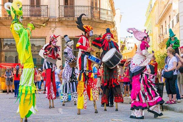 Cuba - Stilt walkers in a parade