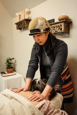 Dr. Michelle Yan performing a treatment.