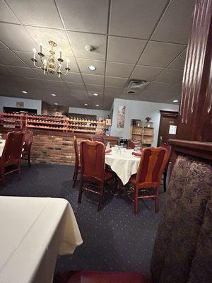 Kitchen doors were hidden by a high wall and the wait station.