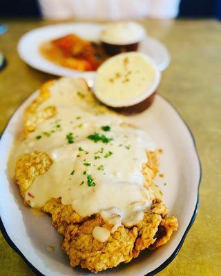 Chicken fried steak with Yukon tomatoes. Bigger than your face!