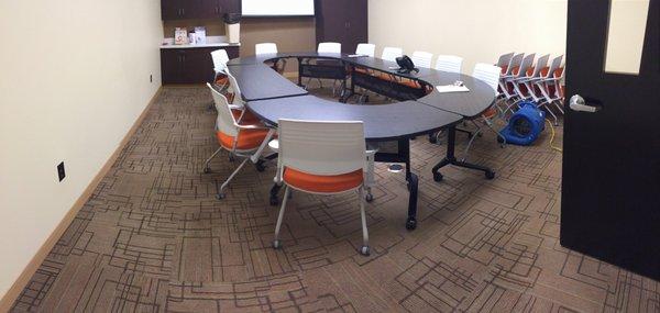 completed carpet shampooing in conference room