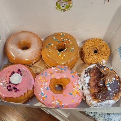 Glazed,  Maple frosted,  coconut, American dream,  strawberry frosted,  chocolate cream donuts