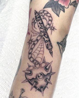 cute fineline mace tattoo by poison ivy