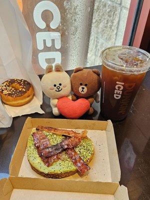 Chocolate glazed donut, Avocado Toast, and free Mocha coffee