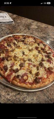 Meat lovers thin crust pizza