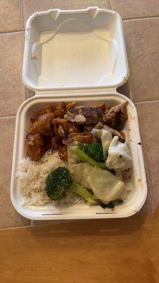 plate meal with orange chicken, white rice, broccoli, and grilled chicken.