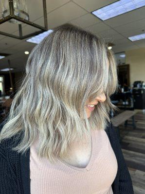 Rooted blonde done by Angela