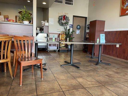 Inside.  A table with hand sanitizer for customer use.