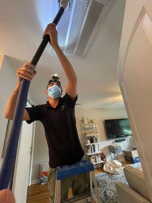 Our team cleaning residential air ducts. Safe and quick