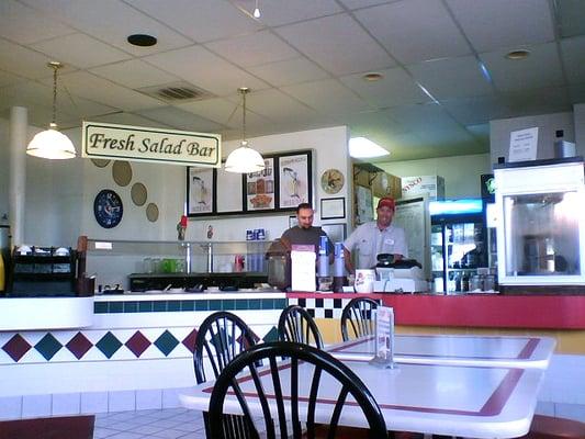 Front counter and a couple employees.