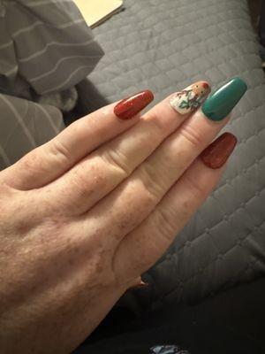 These are my Christmas nails I had done at classy nails spa by Tonya