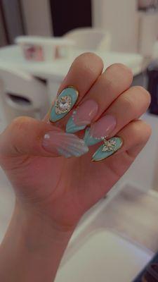 Beautiful custom shell design nails by Biv