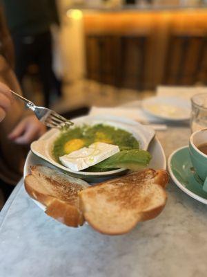 Shakshuka with cheese and challah