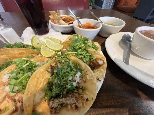 Tacos, Hibiscus agua Fresca, beans, salsas.