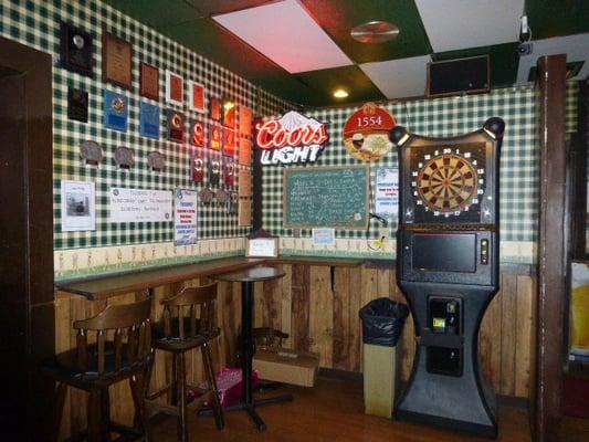 Play darts at Lounge in the Village